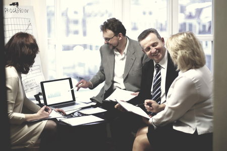 successful business partners discussing a new contractの写真素材