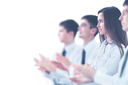 Happy business group applauding the companys success
