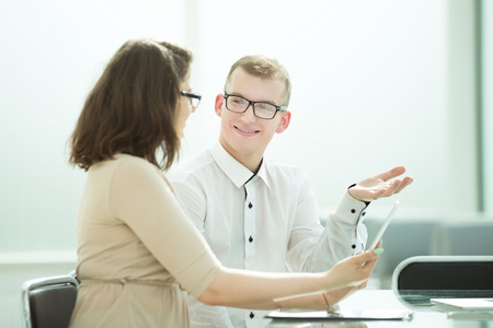 side view. business colleagues discuss work problemsの写真素材