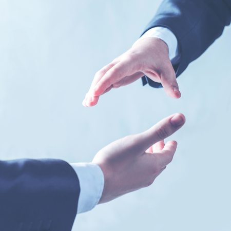 handshake of business partners on a light background.の写真素材