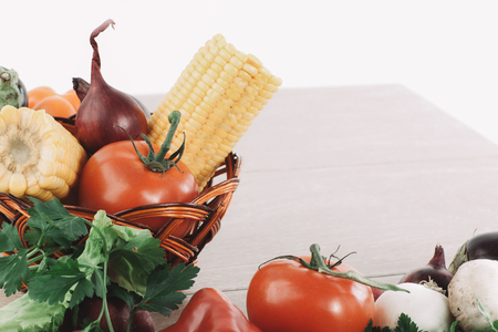 frame made of vegetables on wooden background.の写真素材