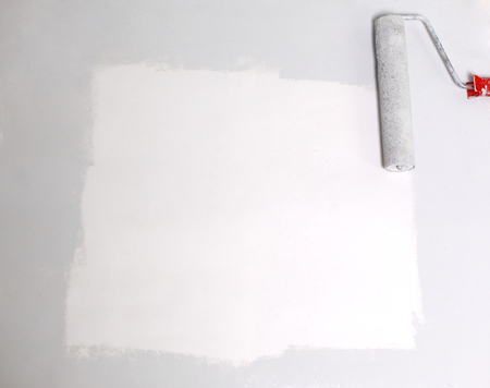 square painted white with the paint roller, on a white sheet ofの写真素材