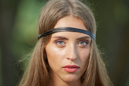 close up. portrait of attractive young hippie woman .