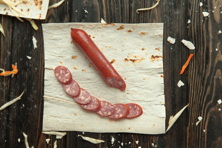 Salami sausage, pita bread and cabbage salad.photo with copy spaceの写真素材
