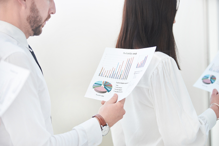 close up.business team with financial statements standing in the officeの写真素材