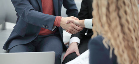 close up.handshake between Manager and client as a sign of cooperationの写真素材