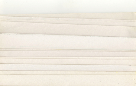 stack of old Newspapers on a white background