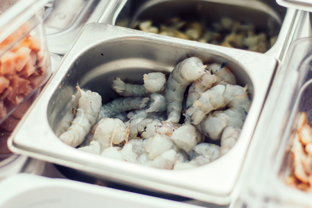close up.shrimp, mussels in a container on the kitchen table in the restaurantの写真素材