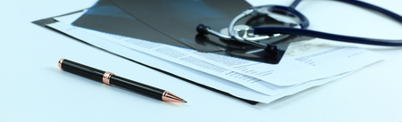 stethoscope and x-rays on a white background.the concept of healthの写真素材