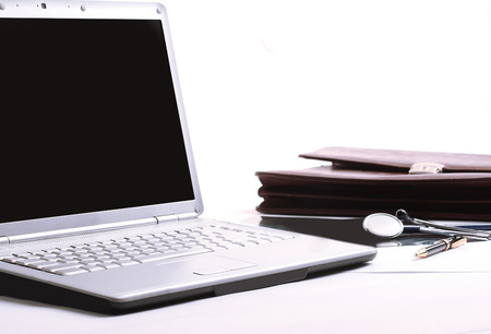 closeup. laptop and stethoscope in the workplace therapist .the concept of health