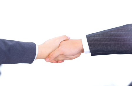 closeup of a business handshake men and business women.the concept of partnership.の写真素材