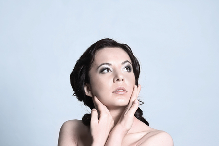 close up. beautiful young woman looking at copy space. isolatedの写真素材