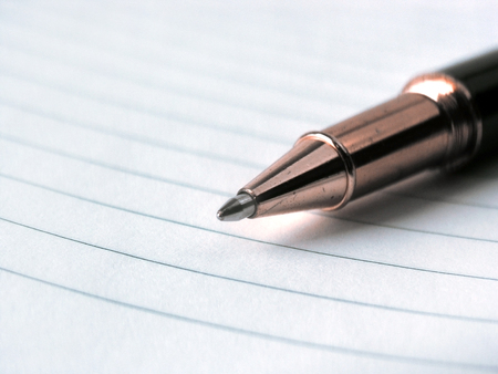 close up.stylish ballpoint pen on notebook sheetの写真素材