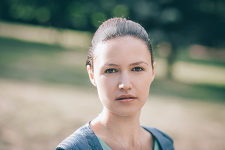 Portrait of attractive young woman on Parkの写真素材