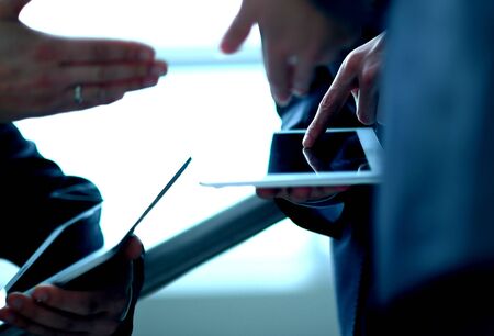 Two businessmen with tablet computersの写真素材