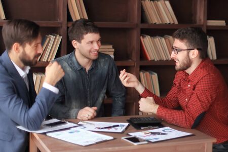 Creative team discussing new ideas in the officeの写真素材