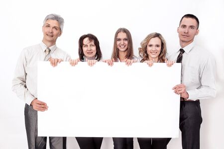 professional business team with big blank posterの写真素材
