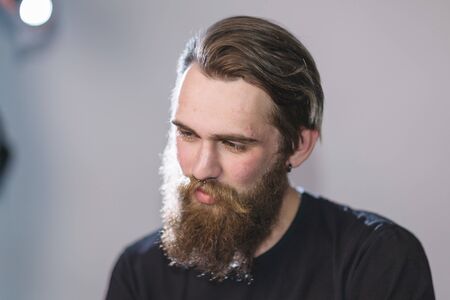 close up. portrait of a handsome bearded manの写真素材