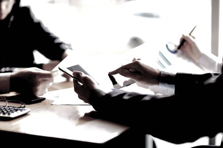 close up. the business team prepares a financial report.