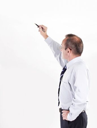 businessman showing a pencil on the copy spaceの写真素材