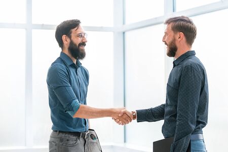 financial partners shaking hands . concept of cooperationの写真素材