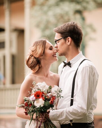 close up. portrait of happy bride and groom .の写真素材