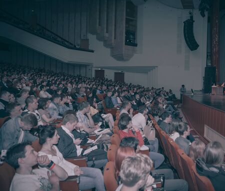 Belarus, Minsk,2015 may 10, business training Ayaz Shubutdinov. side view.the audience sitting in...
