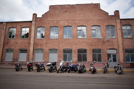 Belarus, Minsk, may 17, 2015, Oktyabrskaya street, biker festival. motorcycles bikers near the city club buildingのeditorial素材