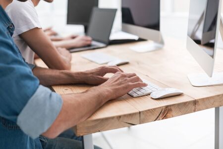 close up. a group of employees working on computersの写真素材