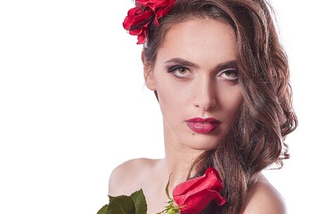 close up.portrait of glamorous woman with red rose.の写真素材