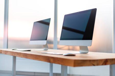 close up. modern computers on a wooden table . business conceptの写真素材