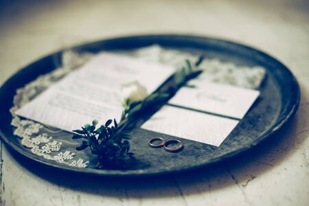 close up.wedding rings on a silver tray.の写真素材