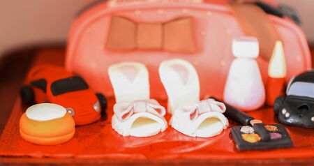 toys and childrens cosmetics on the table by the little girlの写真素材