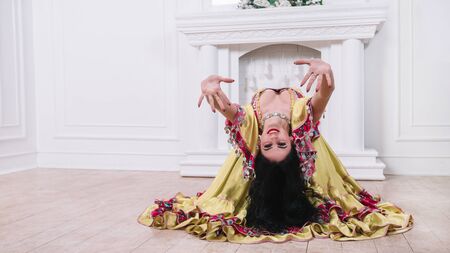 beautiful young woman performing passionate Gypsy dance