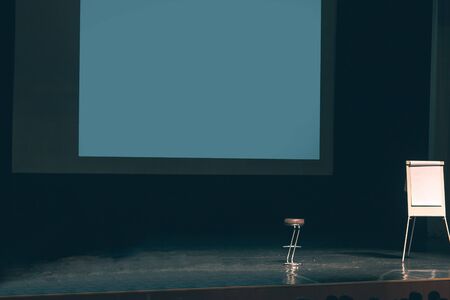 Podium with white screen in the business centerの写真素材
