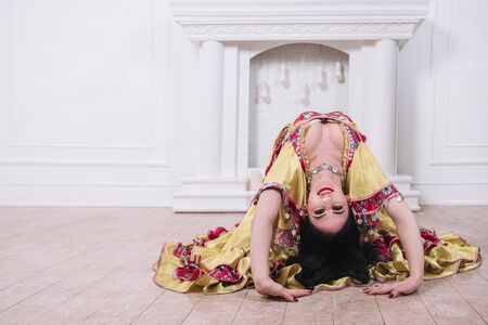 attractive young woman performing passionate Gypsy danceの写真素材