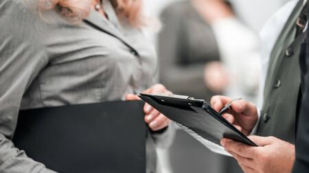 close up. image of business people talking in the officeの写真素材