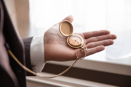 close up. business man looking at his watch.の写真素材