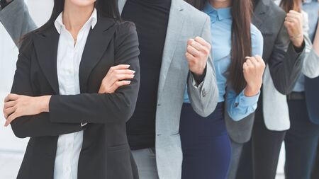happy group of diverse young people standing in a row . the concept of teamworkの写真素材