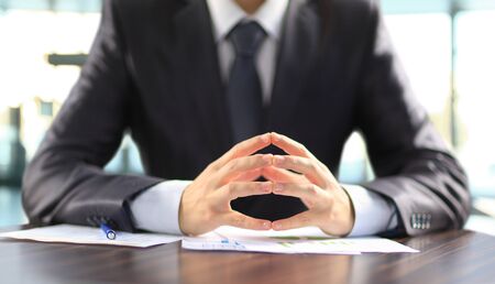 Businessman working with documents in the officeの写真素材