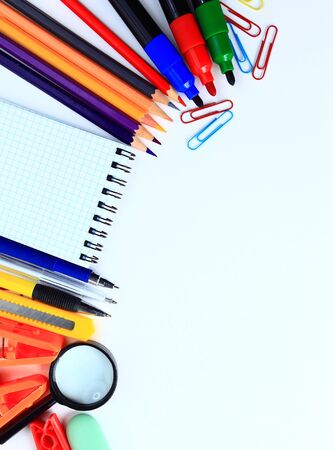 Office and student accessories on a white. Back to school concept.の写真素材