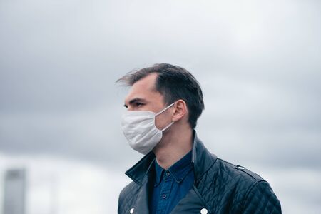 close up. portrait of a young man in a protective mask