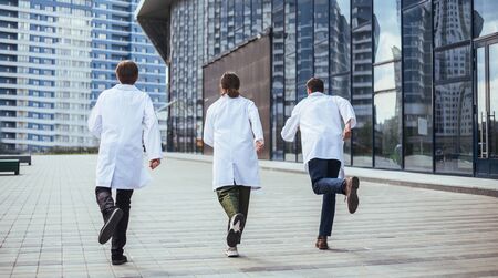 group of rescue doctors runs to provide emergency assistance.の写真素材