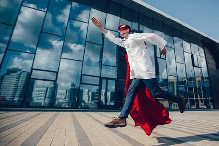 A medic superhero hurries to the sick city resident.の写真素材