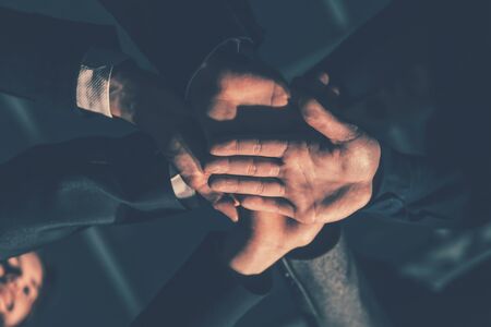 close up. young business people joining their palms together.の写真素材