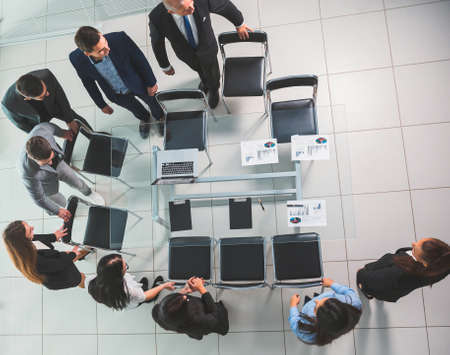 top view. group employees go to the conference room
