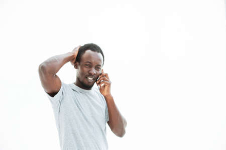 close up. young man talking on mobile phone.の写真素材