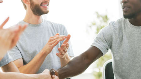 business training participants greeting each other with a handshake