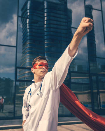 close up. doctor superhero rushes to the rescue.
