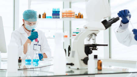 close up. a group of scientists are testing new drugs.の写真素材